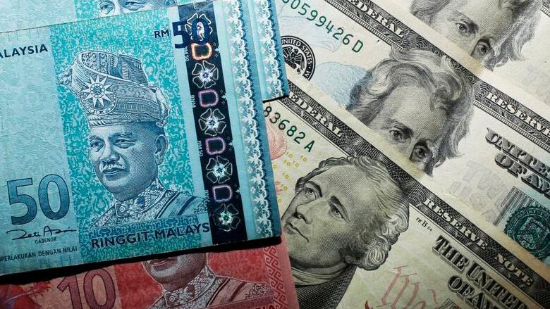 令吉兑美元升破4.0